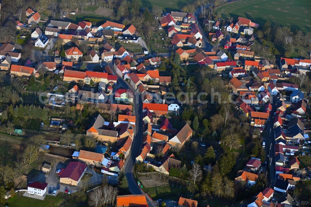 Ostramondra from above - Village view on the edge of agricultural fields and land in Ostramondra in the state Thuringia, Germany