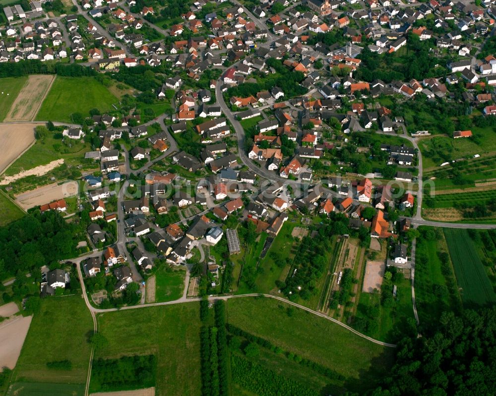 Ottersweier from the bird's eye view: Village view on the edge of agricultural fields and land in Ottersweier in the state Baden-Wuerttemberg, Germany