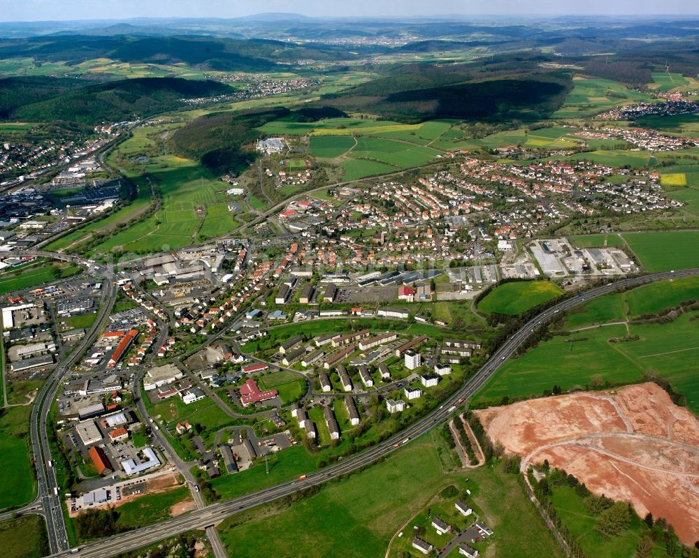 Petersberg from the bird's eye view: Village view on the edge of agricultural fields and land in Petersberg in the state Hesse, Germany