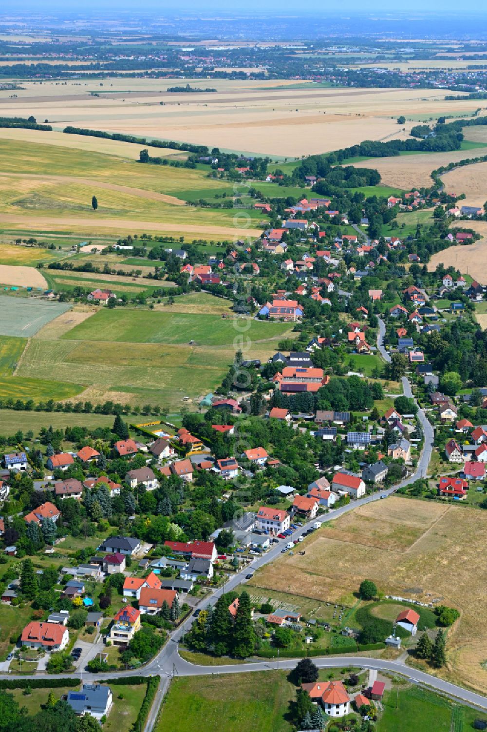 Aerial image Pohrsdorf - Village view on the edge of agricultural fields and land in Pohrsdorf in the state Saxony, Germany