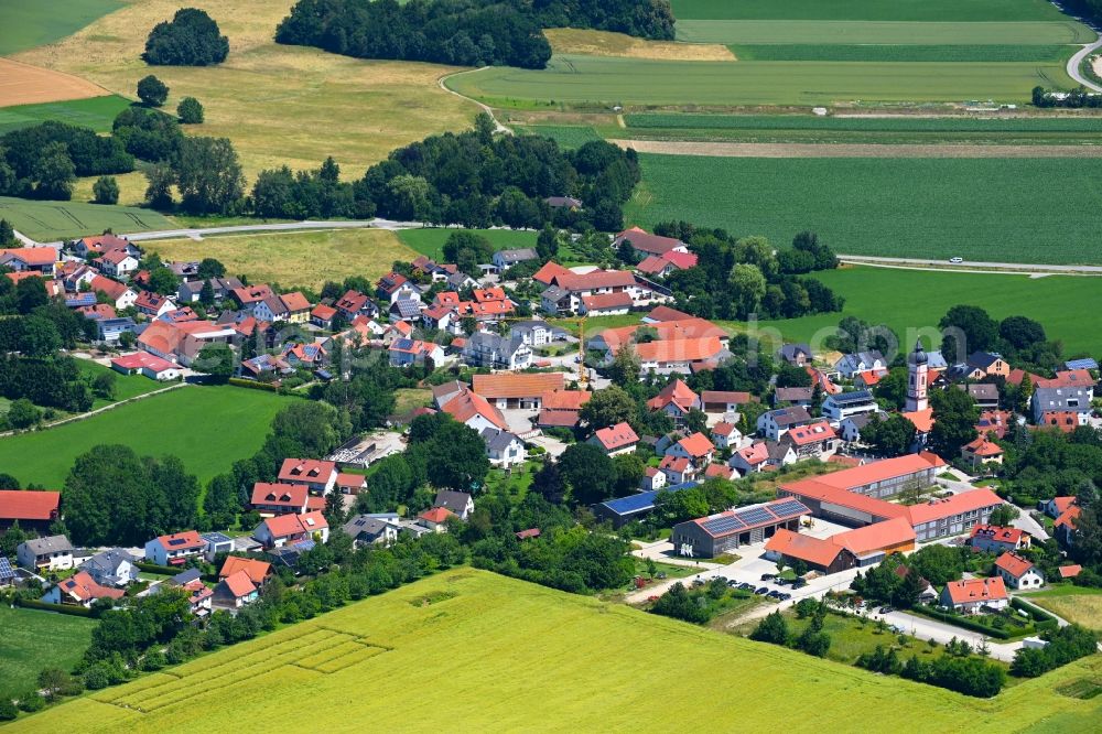 Puch from the bird's eye view: Village view on the edge of agricultural fields and land in Puch in the state Bavaria, Germany