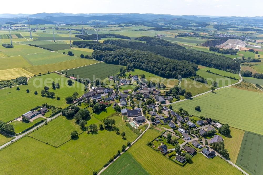 Aerial image Radlinghausen - Village view on the edge of agricultural fields and land in Radlinghausen in the state North Rhine-Westphalia, Germany