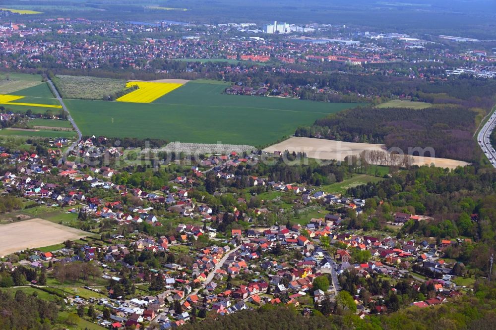 Aerial photograph Rauen - Village view on the edge of agricultural fields and land in Rauen in the state Brandenburg, Germany