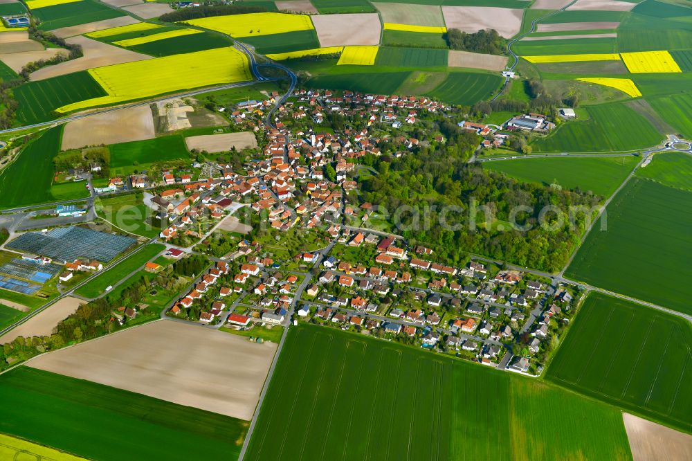 Aerial photograph Rüdenhausen - Village view on the edge of agricultural fields and land in Rüdenhausen in the state Bavaria, Germany