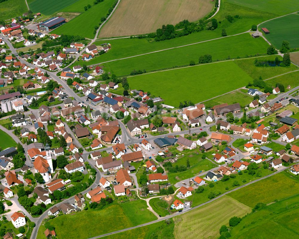 Reinstetten from the bird's eye view: Village view on the edge of agricultural fields and land in Reinstetten in the state Baden-Wuerttemberg, Germany