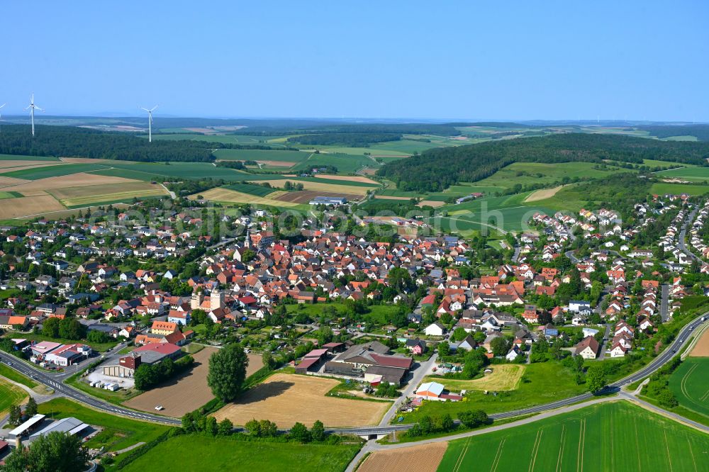 Remlingen from above - Village view on the edge of agricultural fields and land in Remlingen in the state Bavaria, Germany