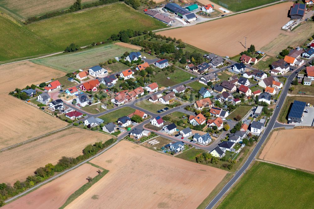 Aerial image Rettersheim - Village view on the edge of agricultural fields and land in Rettersheim in the state Bavaria, Germany