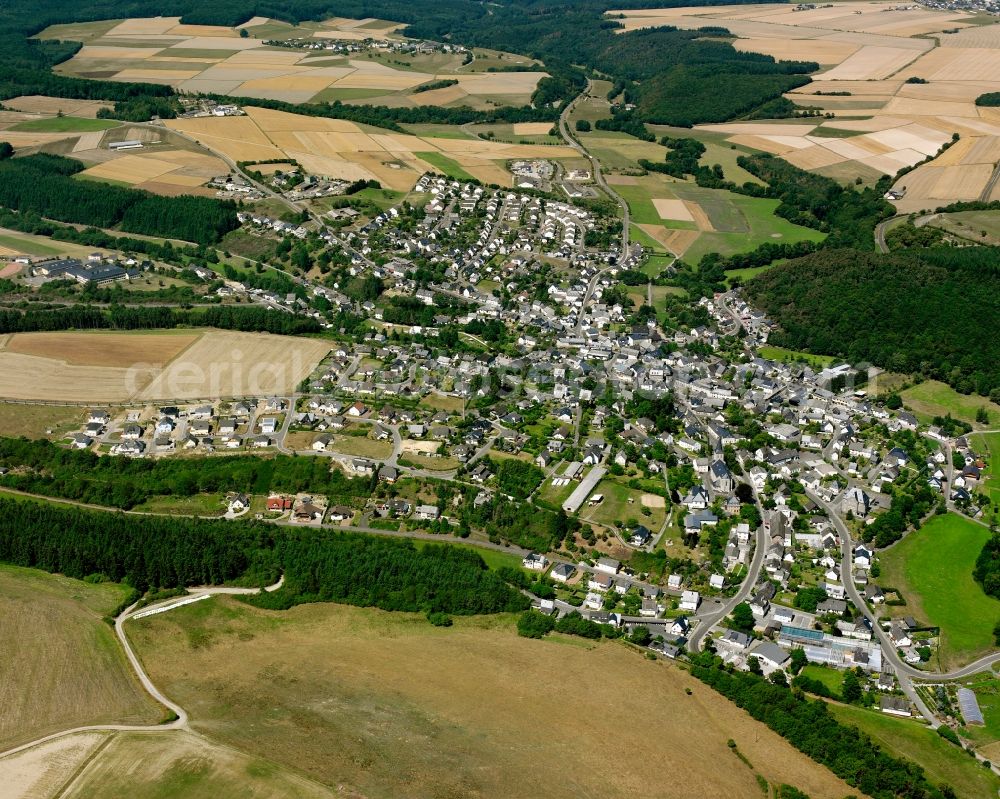 Rhaunen from above - Village view on the edge of agricultural fields and land in Rhaunen in the state Rhineland-Palatinate, Germany