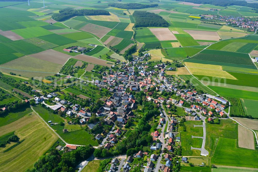 Aerial image Richelbach - Village view on the edge of agricultural fields and land in Richelbach in the state Bavaria, Germany