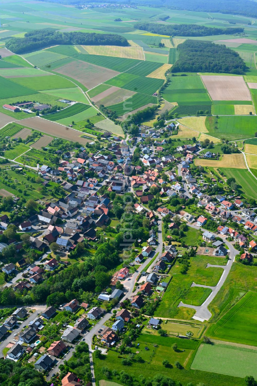 Richelbach from above - Village view on the edge of agricultural fields and land in Richelbach in the state Bavaria, Germany