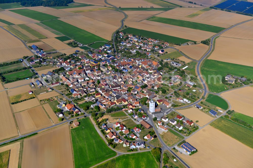 Riedenheim from above - Village view on the edge of agricultural fields and land in Riedenheim in the state Bavaria, Germany