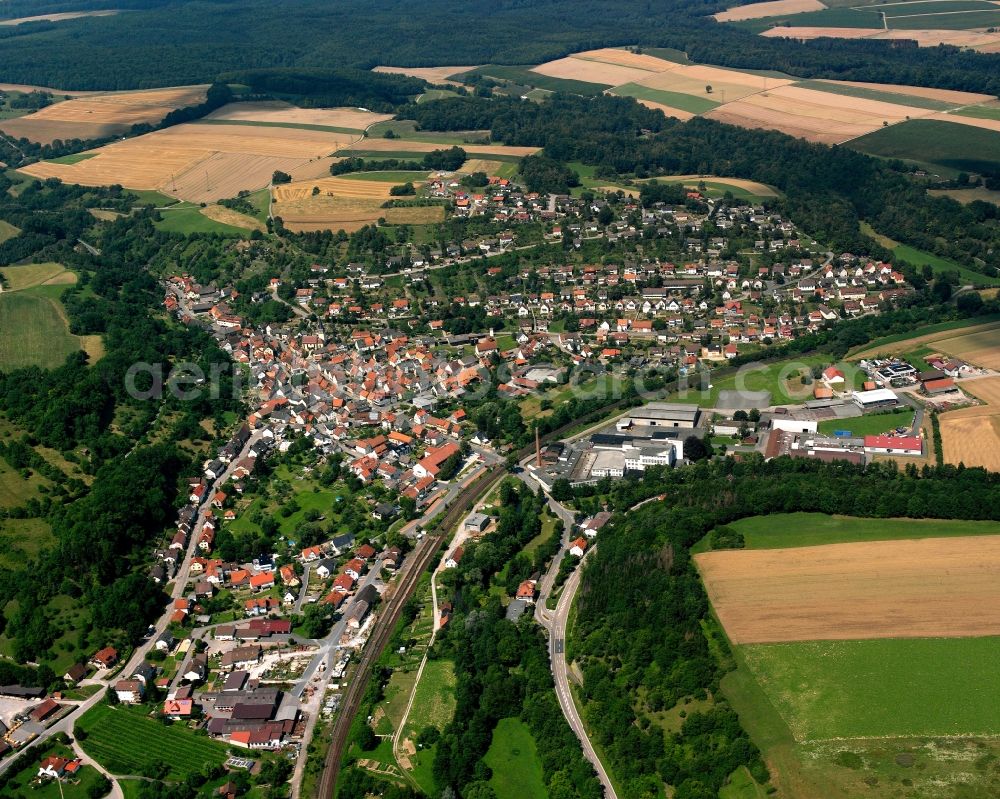 Aerial image Roigheim - Village view on the edge of agricultural fields and land in Roigheim in the state Baden-Wuerttemberg, Germany