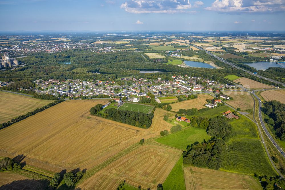 Aerial photograph Roland - Village view on the edge of agricultural fields and land in Roland in the state North Rhine-Westphalia, Germany