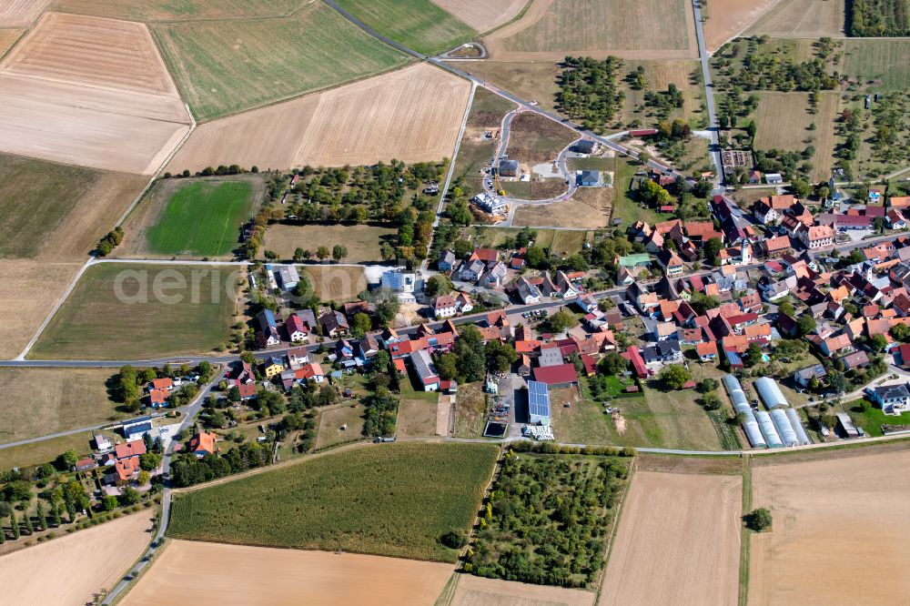 Röttbach from above - Village view on the edge of agricultural fields and land in Röttbach in the state Bavaria, Germany