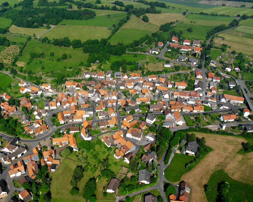 Aerial image Rudingshain - Village view on the edge of agricultural fields and land in Rudingshain in the state Hesse, Germany