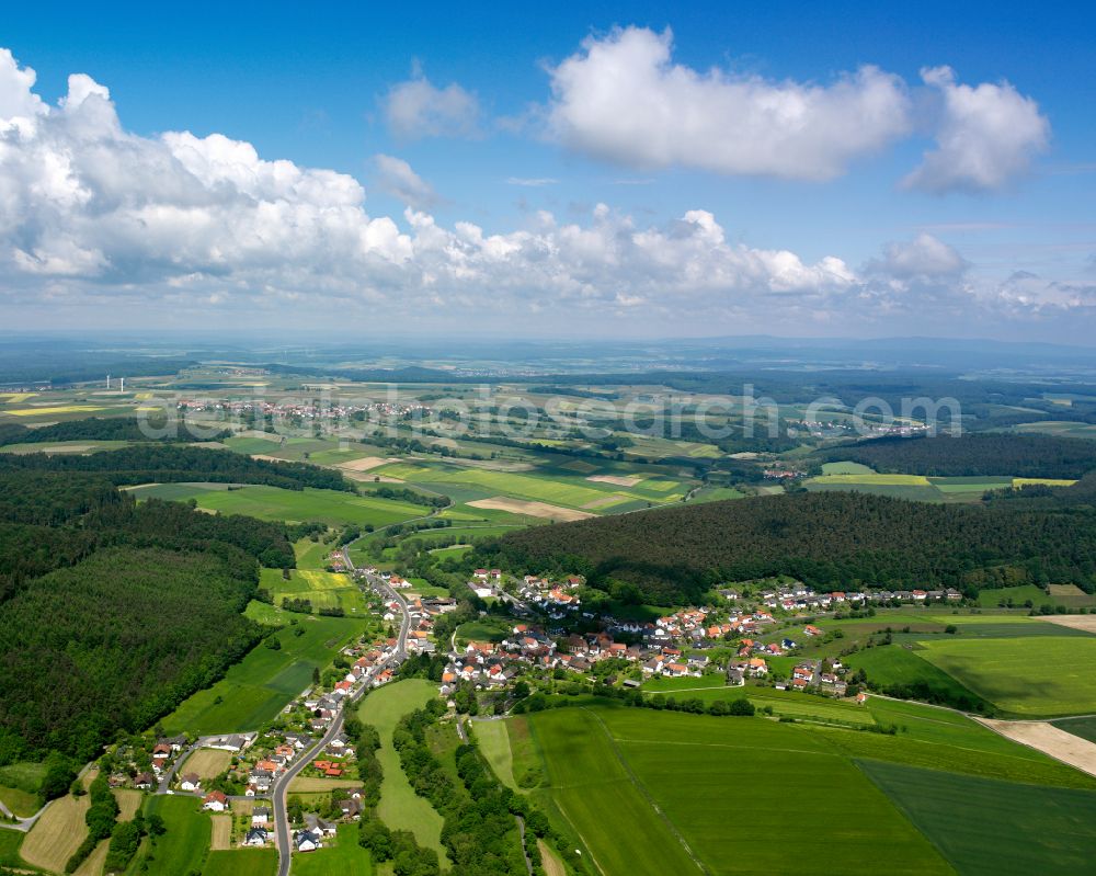 Ruhlkirchen from above - Village view on the edge of agricultural fields and land in Ruhlkirchen in the state Hesse, Germany