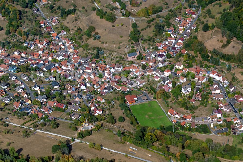 Ruppertshütten from above - Village view on the edge of agricultural fields and land in Ruppertshütten in the state Bavaria, Germany