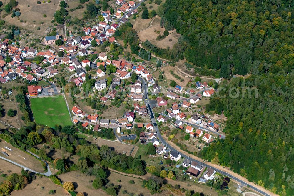 Ruppertshütten from the bird's eye view: Village view on the edge of agricultural fields and land in Ruppertshütten in the state Bavaria, Germany