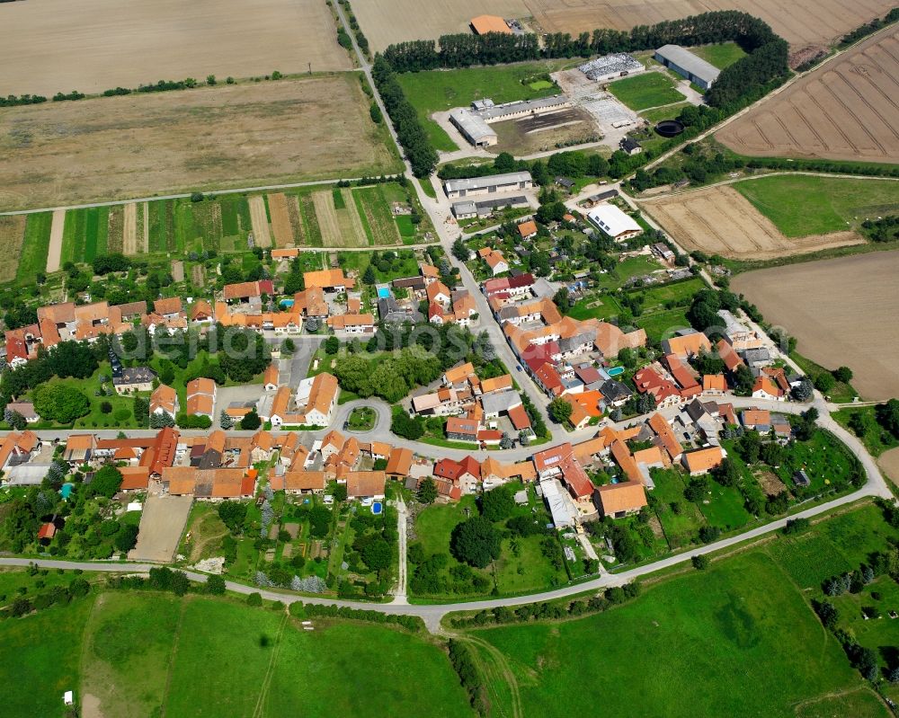 Aerial image Saalfeld - Village view on the edge of agricultural fields and land in Saalfeld in the state Thuringia, Germany