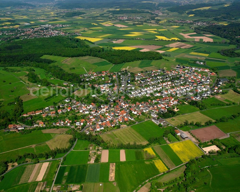 Salzböden from the bird's eye view: Village view on the edge of agricultural fields and land in Salzböden in the state Hesse, Germany