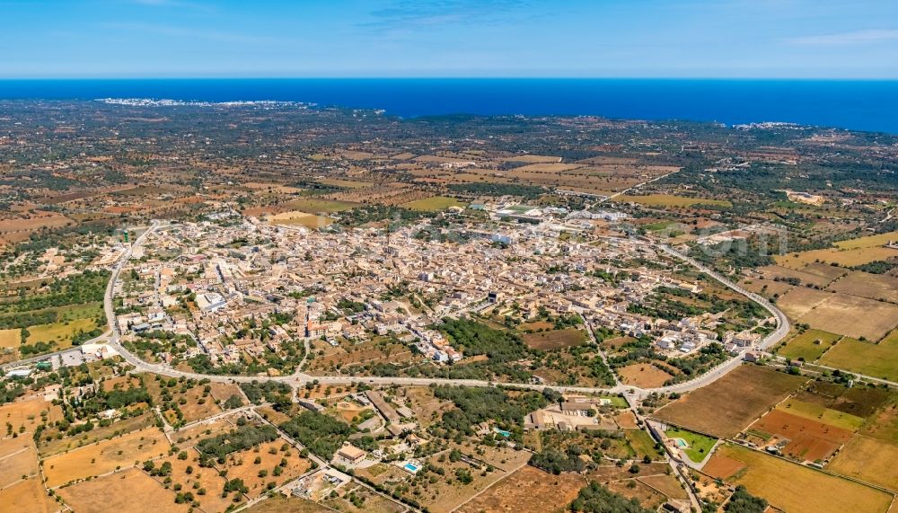 Aerial image Santanyi - Village view on the edge of agricultural fields and land in Santanyi in Balearic island of Mallorca, Spain