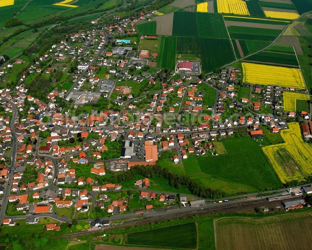 Aerial photograph Schenklengsfeld - Village view on the edge of agricultural fields and land in Schenklengsfeld in the state Hesse, Germany