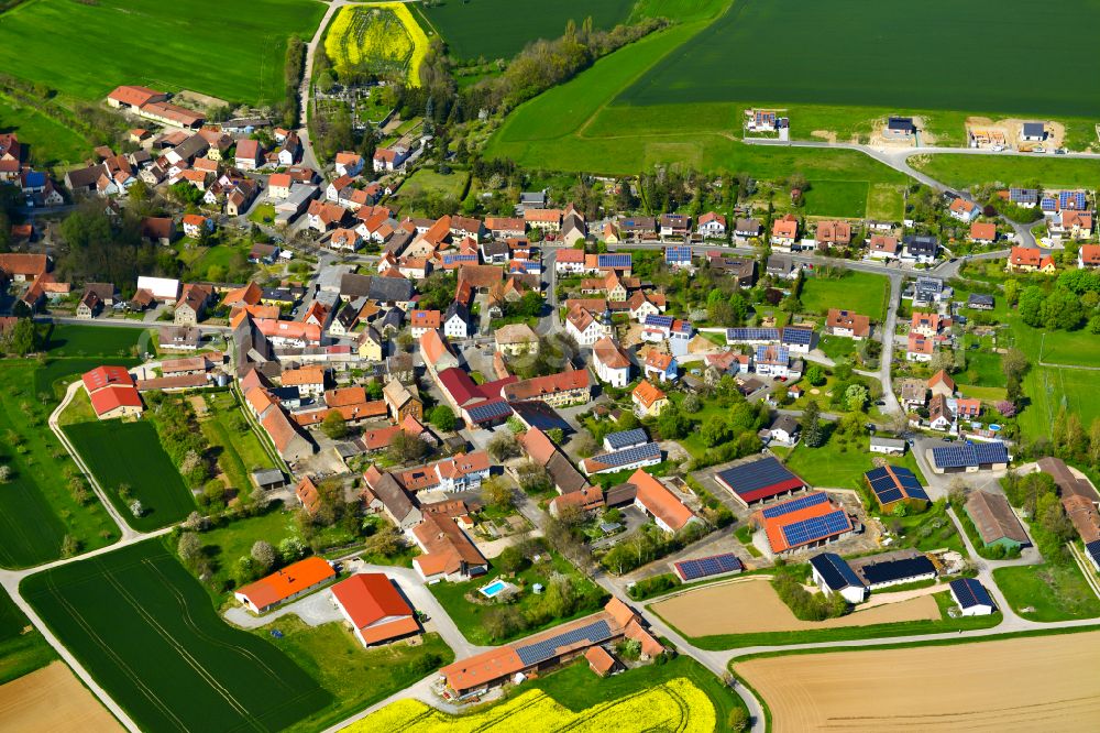 Aerial photograph Schernau - Village view on the edge of agricultural fields and land in Schernau in the state Bavaria, Germany