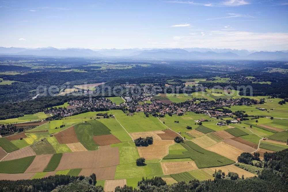 Schäftlarn from the bird's eye view: Village view on the edge of agricultural fields and land in Schaeftlarn in the state Bavaria, Germany