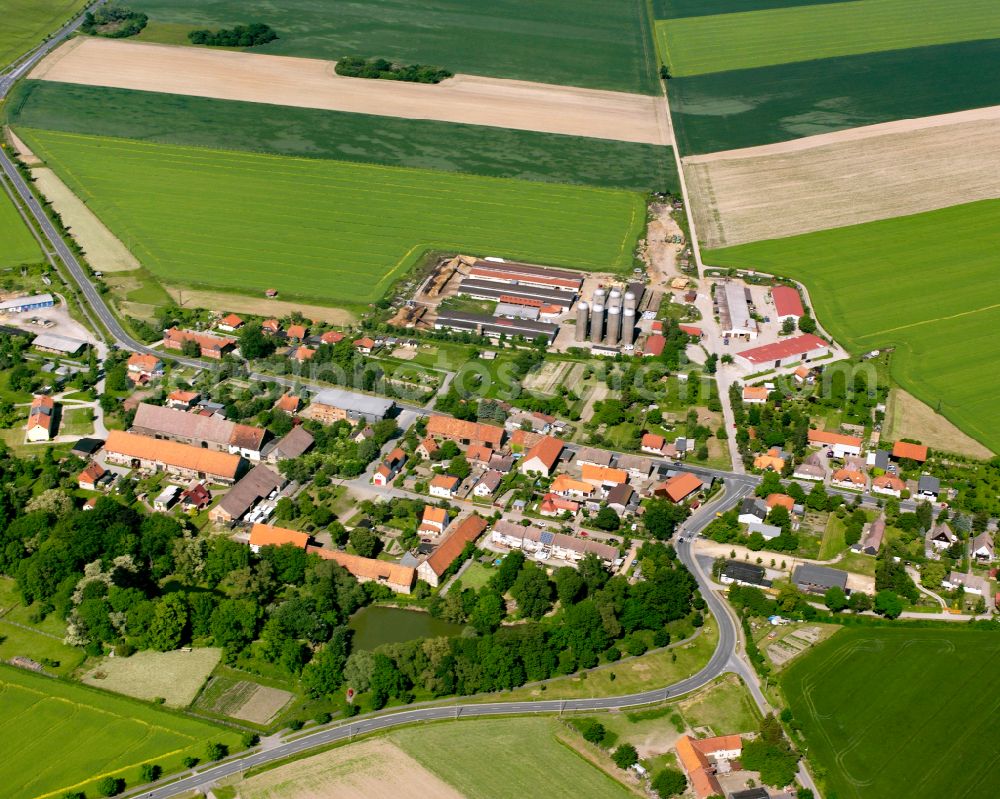 Aerial image Schmatzfeld - Village view on the edge of agricultural fields and land in Schmatzfeld in the state Saxony-Anhalt, Germany