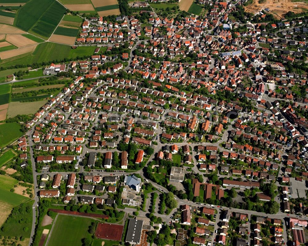 Schwaikheim from the bird's eye view: Village view on the edge of agricultural fields and land in Schwaikheim in the state Baden-Wuerttemberg, Germany