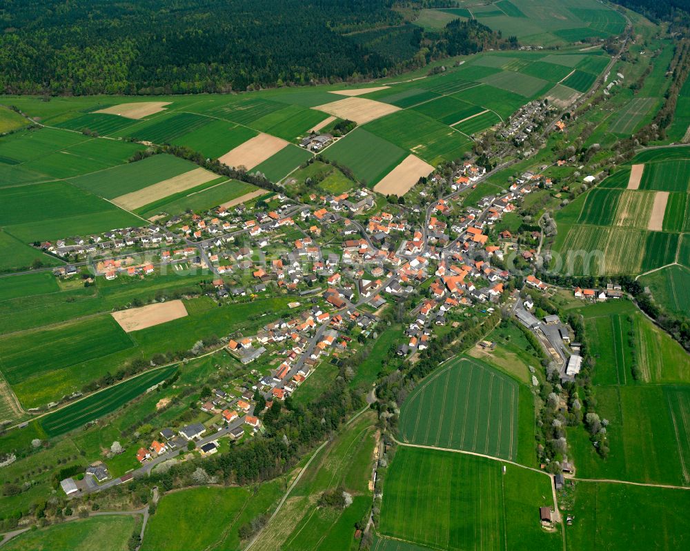 Schwarz from above - Village view on the edge of agricultural fields and land in Schwarz in the state Hesse, Germany