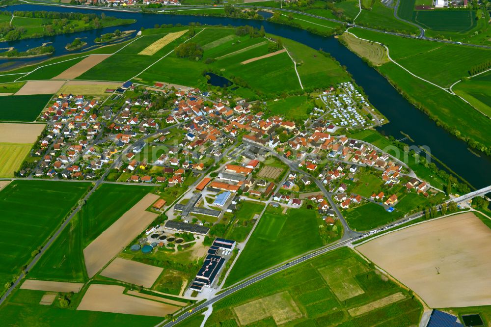 Schwarzenau from above - Village view on the edge of agricultural fields and land in Schwarzenau in the state Bavaria, Germany