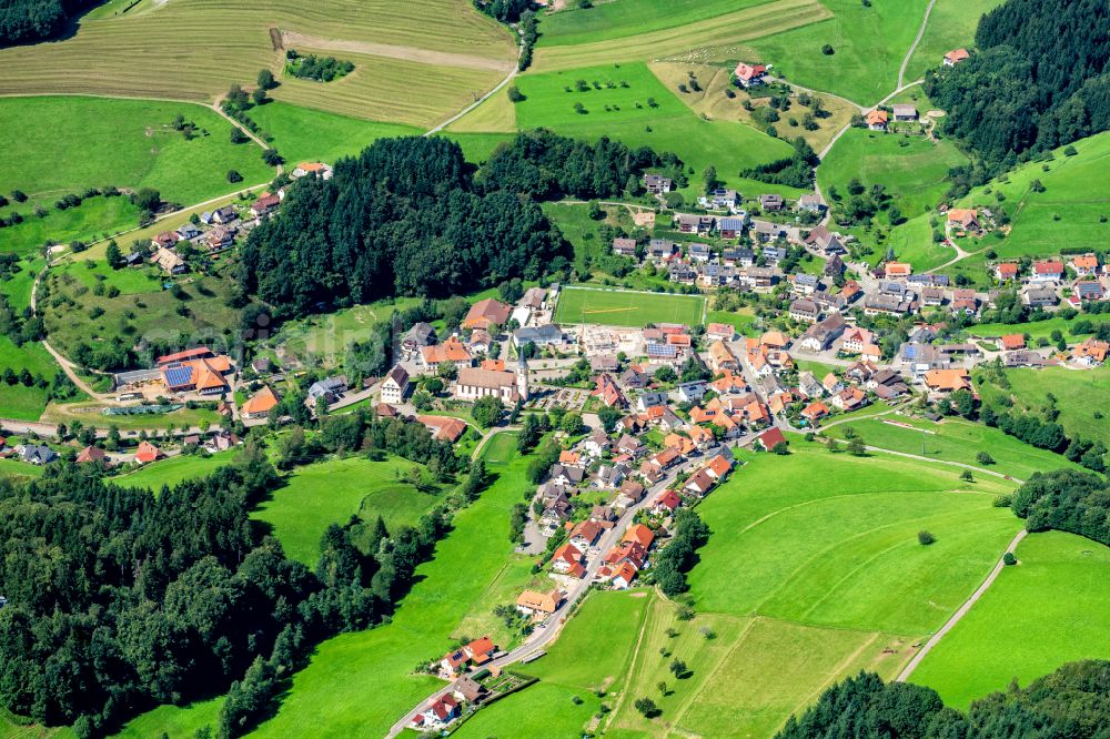 Schweighausen from the bird's eye view: Village view on the edge of agricultural fields and land in Schweighausen in the state Baden-Wuerttemberg, Germany