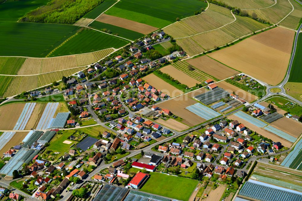 Segnitz from the bird's eye view: Village view on the edge of agricultural fields and land in Segnitz in the state Bavaria, Germany