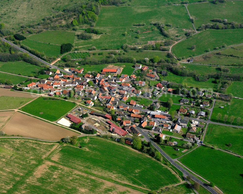 Aerial photograph Sichenhausen - Village view on the edge of agricultural fields and land in Sichenhausen in the state Hesse, Germany