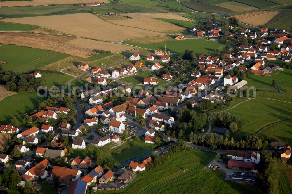 Sielenbach from the bird's eye view: Village view on the edge of agricultural fields and land in Sielenbach in the state Bavaria, Germany