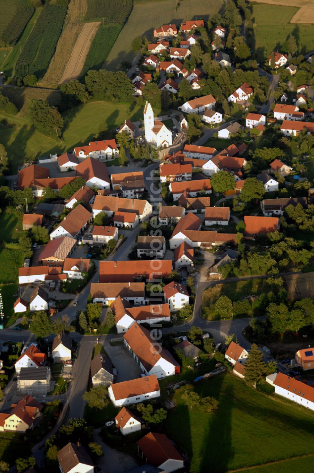 Sielenbach from the bird's eye view: Village view on the edge of agricultural fields and land in Sielenbach in the state Bavaria, Germany