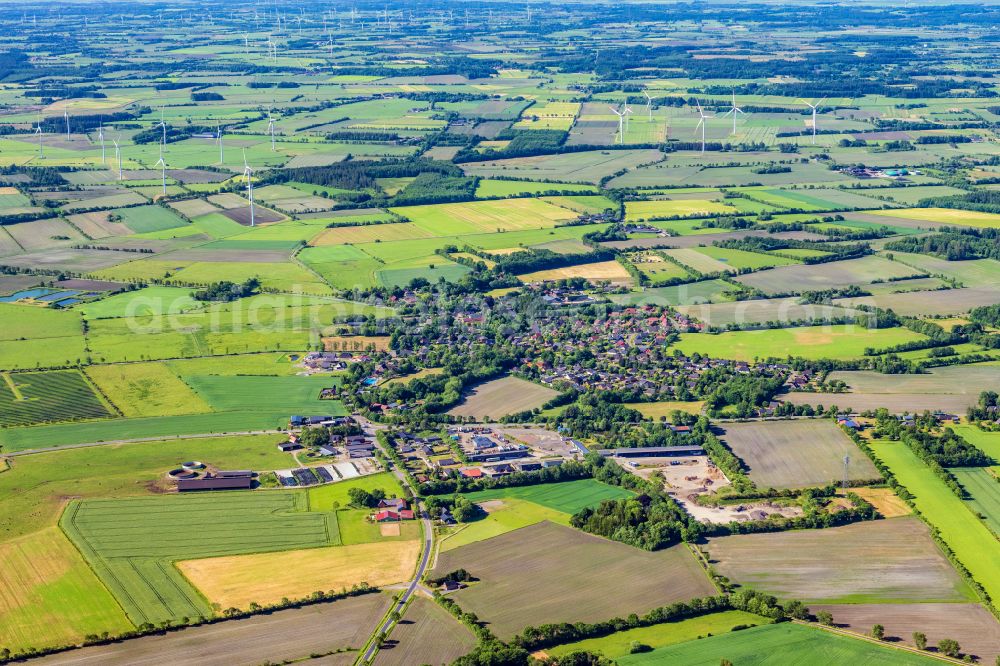 Stadum from the bird's eye view: Village view on the edge of agricultural fields and land in Stadum in the state Schleswig-Holstein, Germany