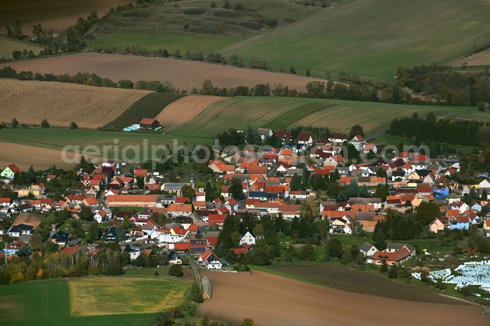 Steinthaleben from above - Village view on the edge of agricultural fields and land in Steinthaleben Kyffhaeuserland in the state Thuringia, Germany