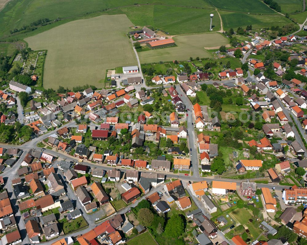 Stiege from above - Village view on the edge of agricultural fields and land in Stiege in the state Saxony-Anhalt, Germany