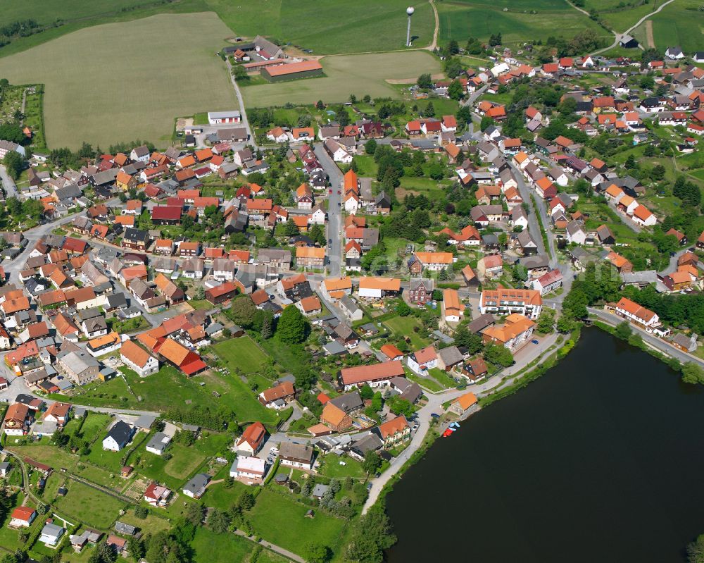 Stiege from the bird's eye view: Village view on the edge of agricultural fields and land in Stiege in the state Saxony-Anhalt, Germany