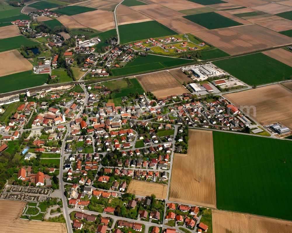 Straßkirchen from the bird's eye view: Village view on the edge of agricultural fields and land in Straßkirchen in the state Bavaria, Germany