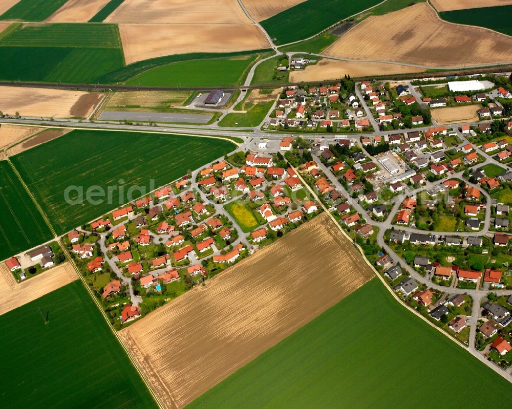 Aerial image Straßkirchen - Village view on the edge of agricultural fields and land in Straßkirchen in the state Bavaria, Germany