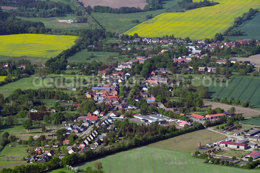 Aerial image Suckow - Village view on the edge of agricultural fields and land in Suckow in the state Mecklenburg - Western Pomerania, Germany