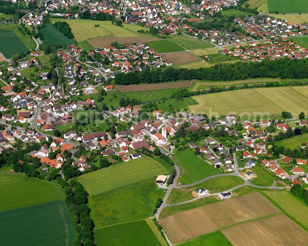 Sulmingen from the bird's eye view: Village view on the edge of agricultural fields and land in Sulmingen in the state Baden-Wuerttemberg, Germany