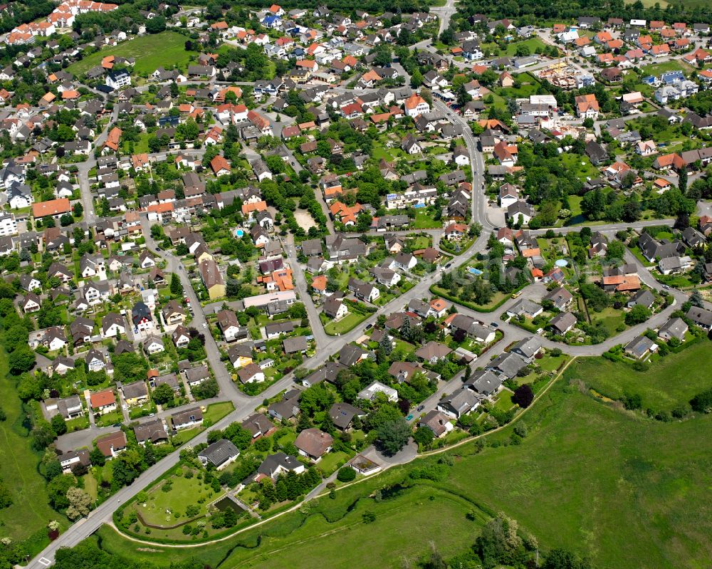 Sundheim from the bird's eye view: Village view on the edge of agricultural fields and land in Sundheim in the state Baden-Wuerttemberg, Germany