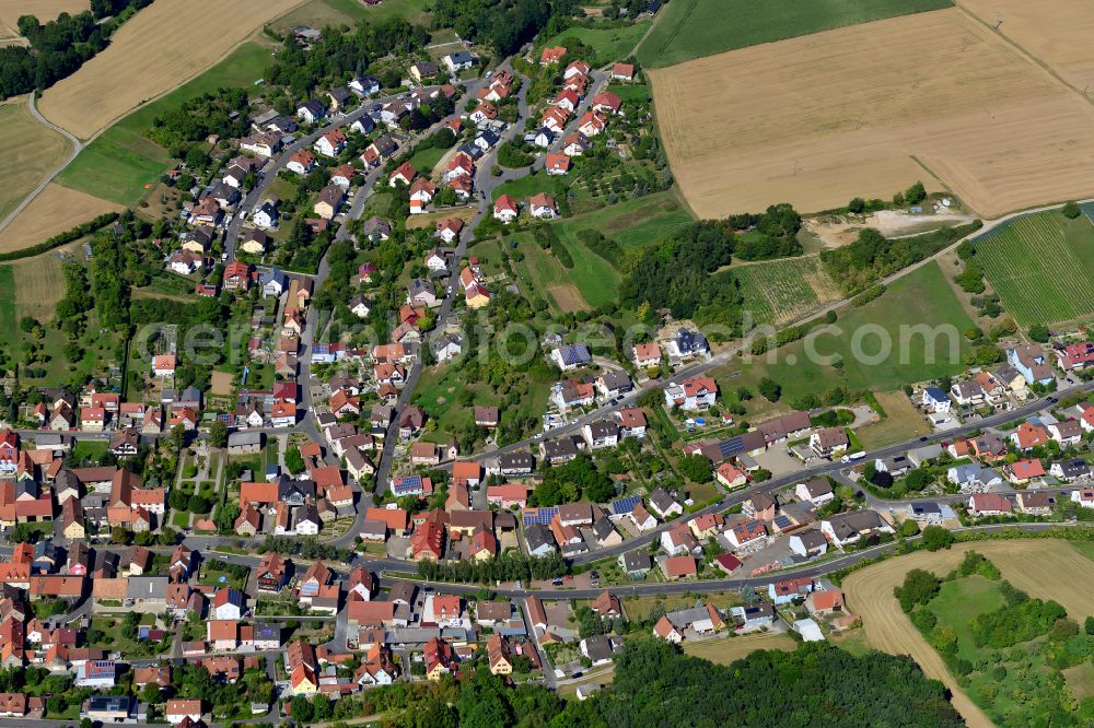 Aerial photograph Theilheim - Village view on the edge of agricultural fields and land in Theilheim in the state Bavaria, Germany