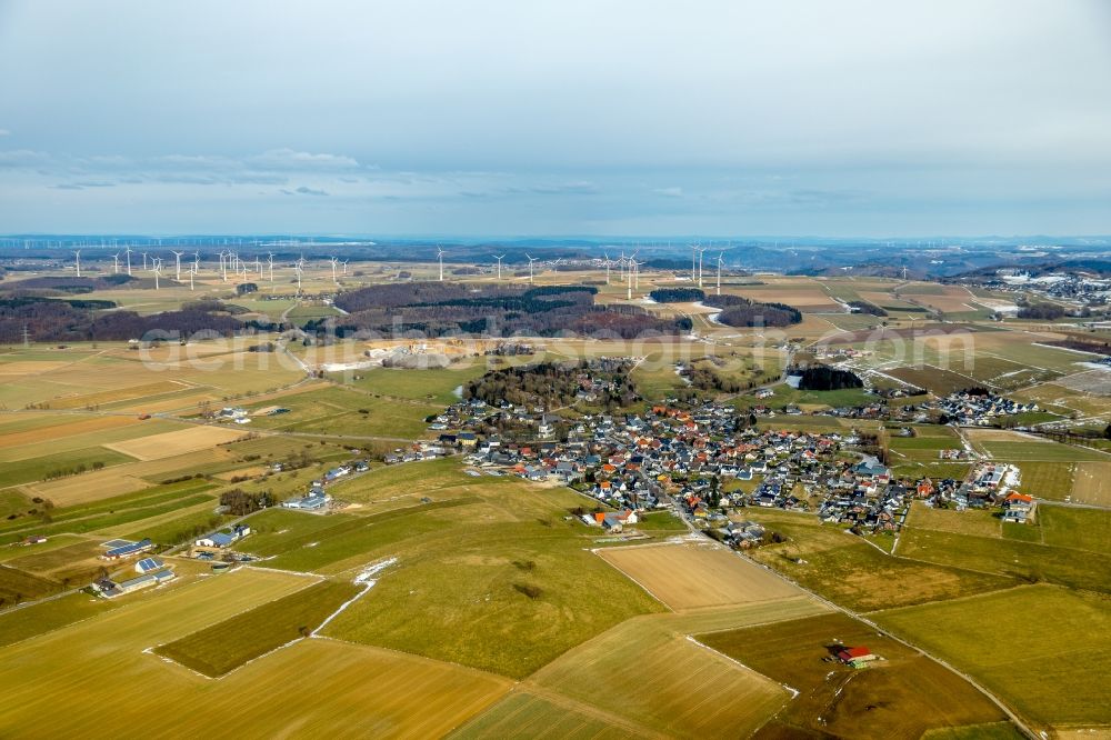 Thülen from the bird's eye view: Village view on the edge of agricultural fields and land in Thuelen in the state North Rhine-Westphalia, Germany