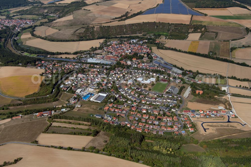 Thüngen from the bird's eye view: Village view on the edge of agricultural fields and land in Thüngen in the state Bavaria, Germany