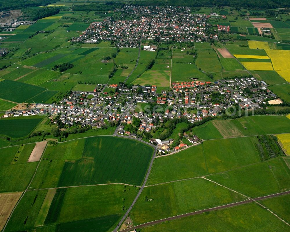 Trohe from the bird's eye view: Village view on the edge of agricultural fields and land in Trohe in the state Hesse, Germany